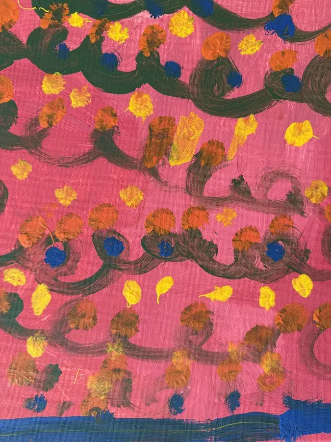 A child's painting of swirls and dots on a pink background